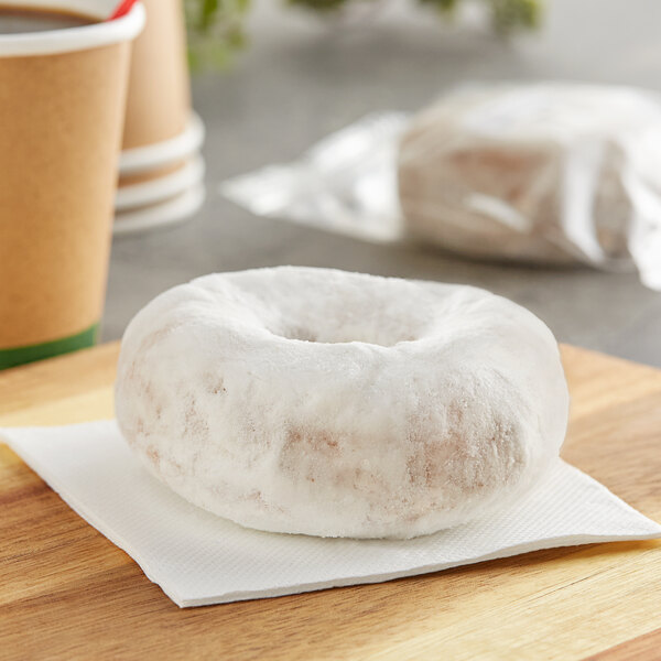 A Katz Gluten-Free powdered donut on a napkin.