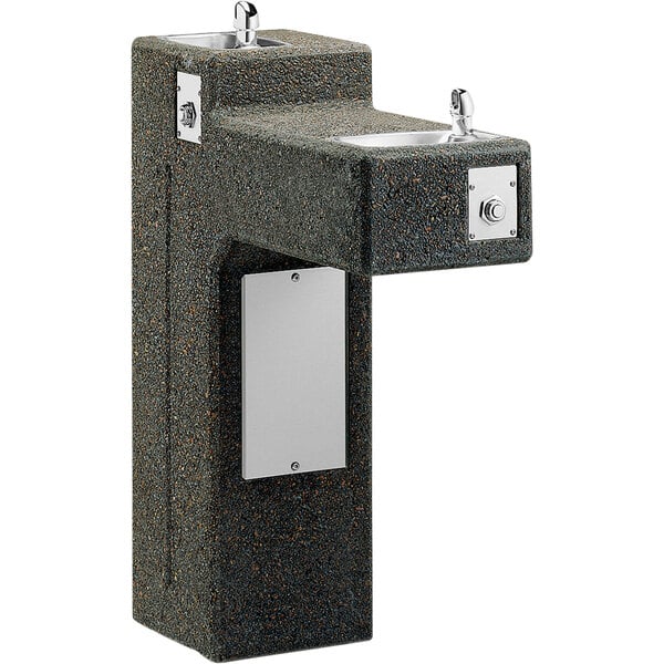 An Elkay stone bi-level outdoor drinking fountain with two taps.