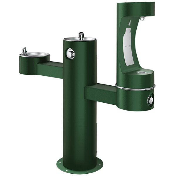 An Elkay green outdoor pedestal drinking fountain with two water fountains.
