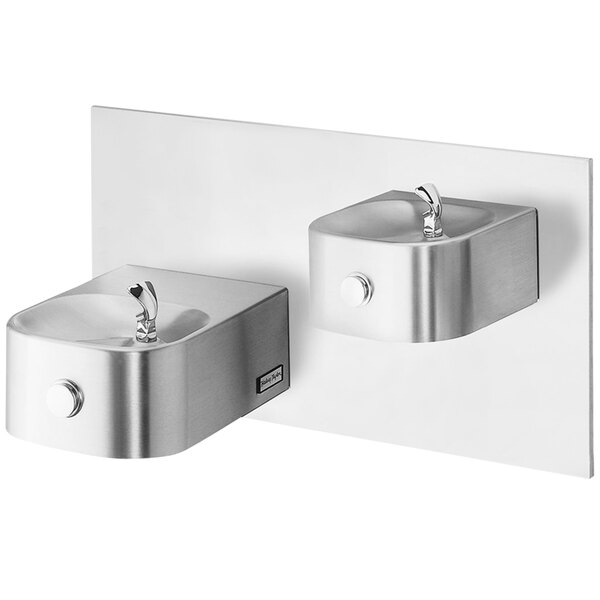 A Halsey Taylor stainless steel reverse bi-level wall mount drinking fountain.