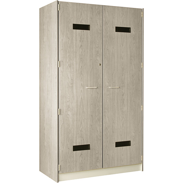 A natural elm I.D. Systems wooden locker cabinet with two doors.