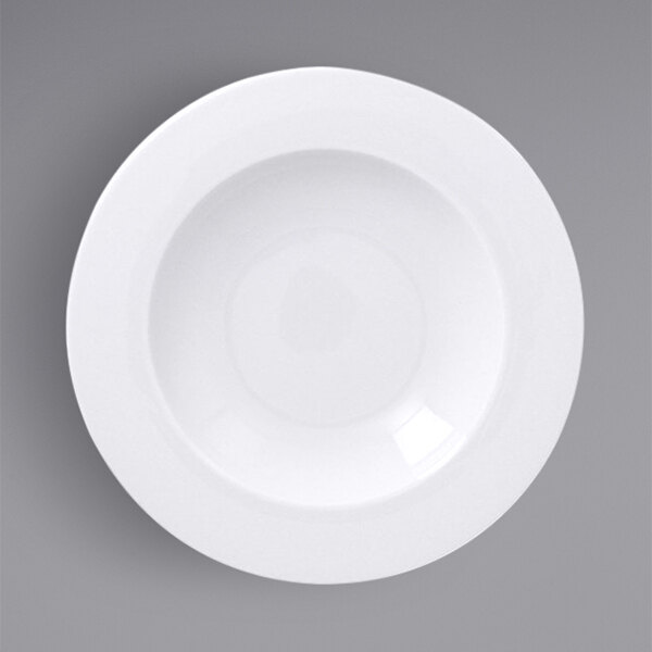 A white porcelain deep plate with a wide rim.