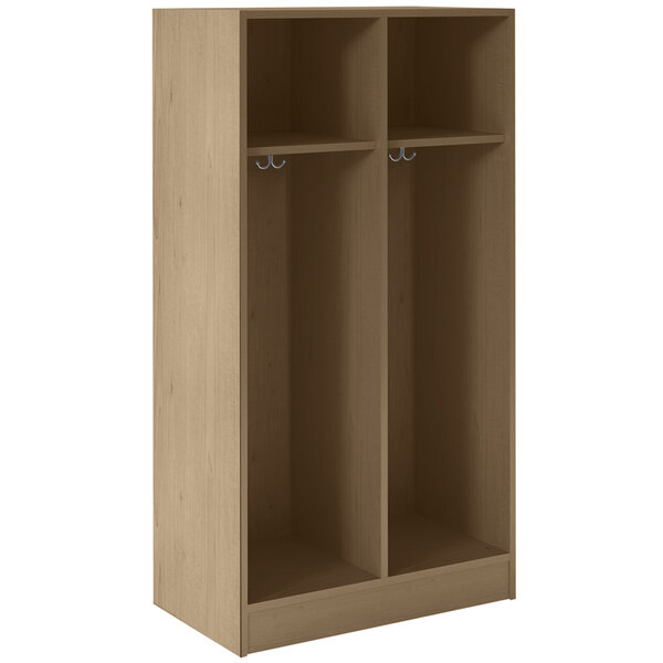 A wooden I.D. Systems double storage locker with two shelves and two doors.