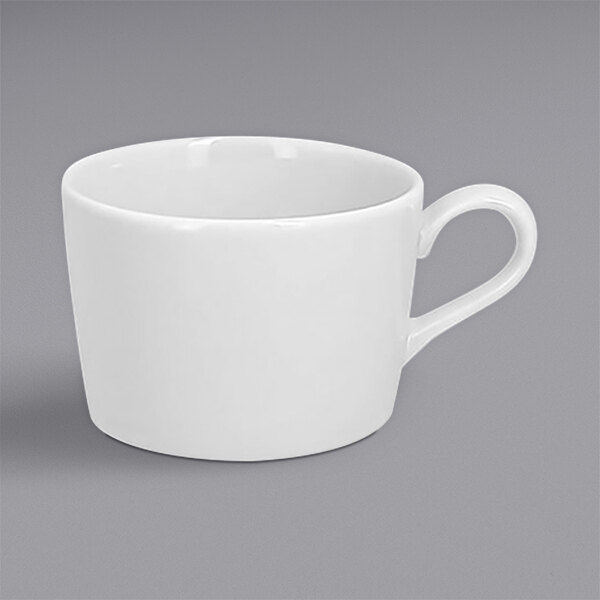A RAK Porcelain bright white tea cup with a handle.