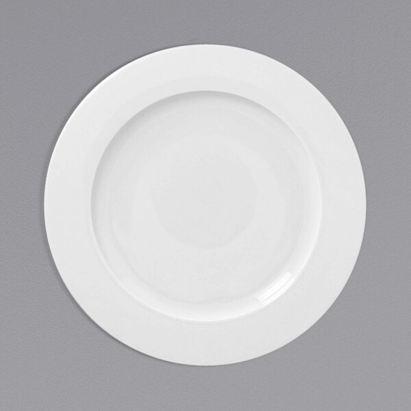 A white plate with a white rim.