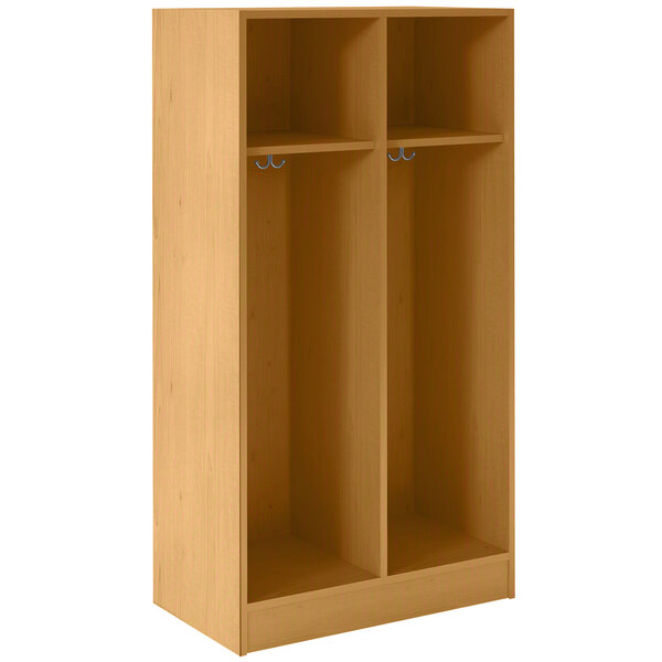 A light oak wooden locker with two shelves and two doors.
