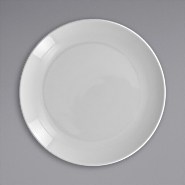 A RAK Porcelain white plate with a white rim.