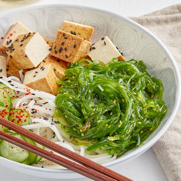 A plate of Goma Wakame Seaweed Salad with chopsticks.