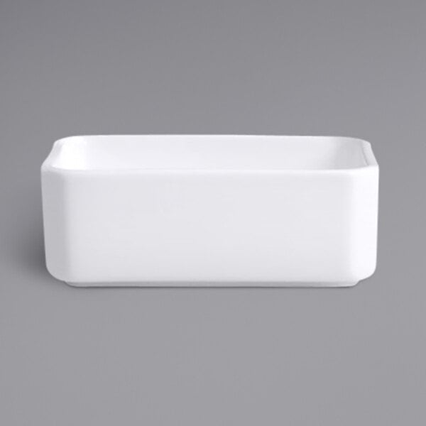 A white rectangular RAK Porcelain sugar packet holder.