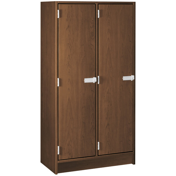 A dark brown wooden locker cabinet with double doors and silver handles.