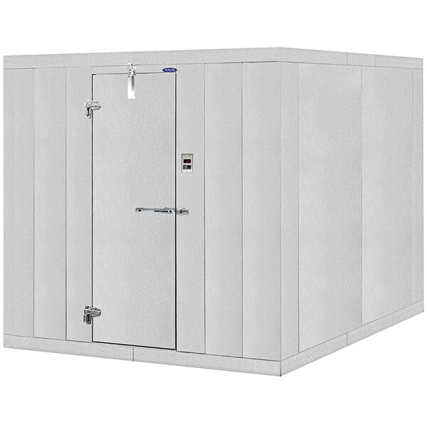 A white Norlake walk-in freezer with the door open.