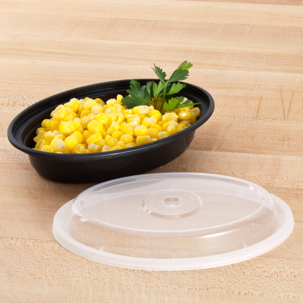 Pactiv Newspring OC06B 6 oz. Black 5 3/4" x 4" x 1 1/8" VERSAtainer Oval Microwavable Container With Lid - 150/Case