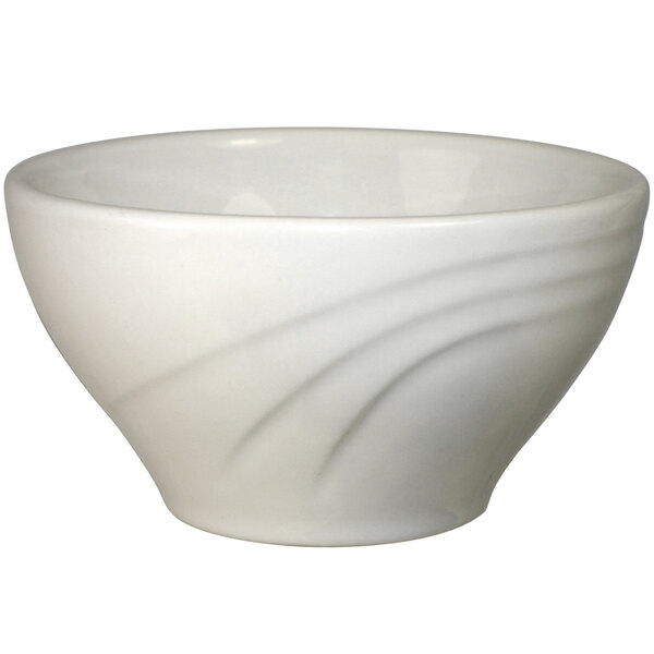 An ivory stoneware bowl with a swirl design.