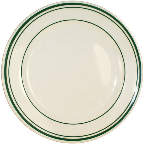 An International Tableware Verona ivory stoneware plate with green bands.