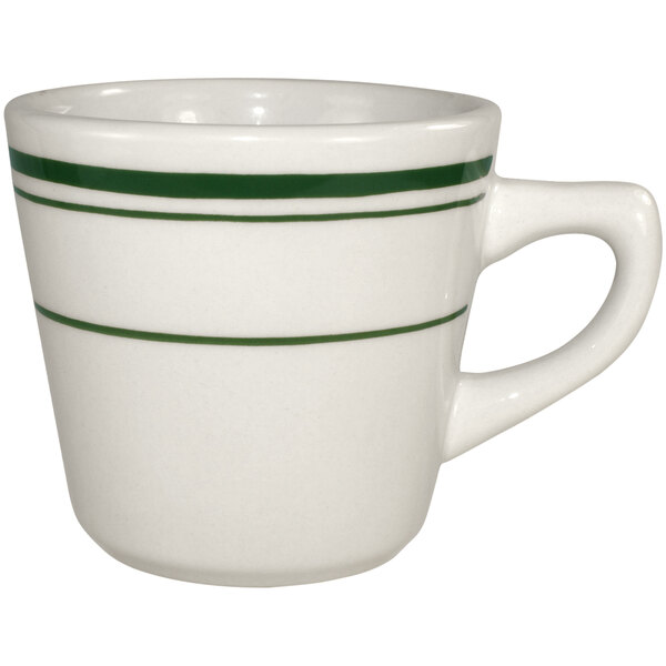 An International Tableware ivory stoneware tall cup with green bands.