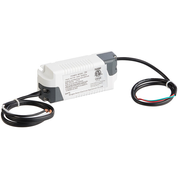 A white Avantco LED driver with black and white wires.