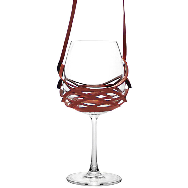 A Franmara Burgundy wine glass with a leather cozie and lanyard strap.