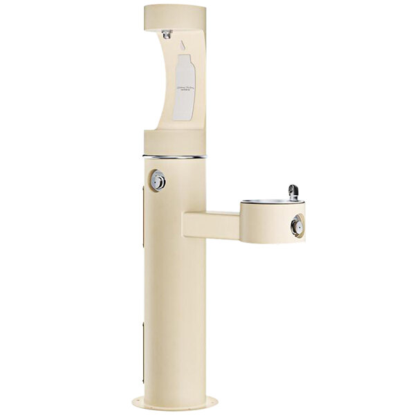 A beige Halsey Taylor water fountain with a silver bottle filling handle.