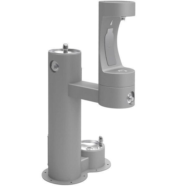 A gray Halsey Taylor water fountain with two taps and a pet station.