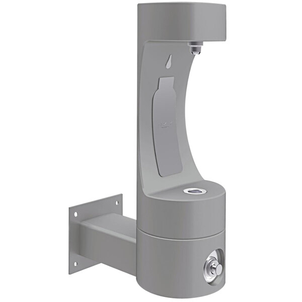 A grey Halsey Taylor wall mount bottle filling station with a rectangular shape and key access.