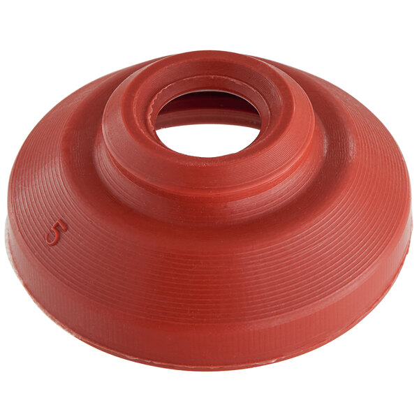 A red rubber Narvon watertight seal with a hole in it.