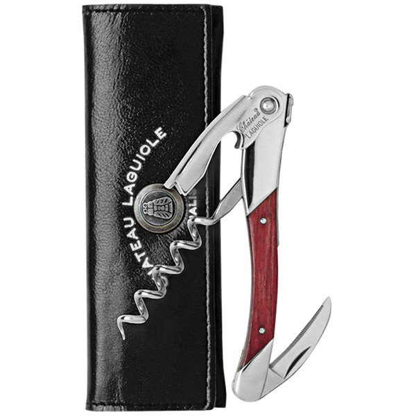 A Chateau Laguiole Grand Cru red stamina wood waiter's corkscrew with a bottle opener in a leather case.