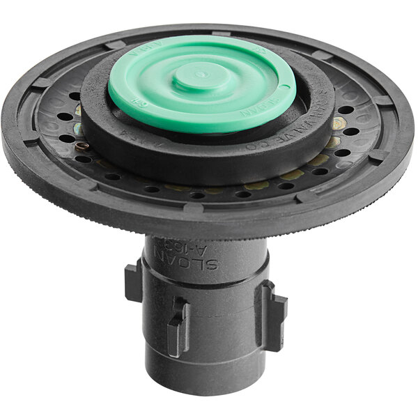 A black and green circular Sloan diaphragm repair kit with a green lid.