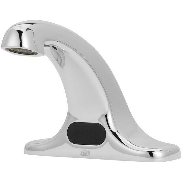 A stainless steel Zurn AquaSense electronic faucet with a black button.