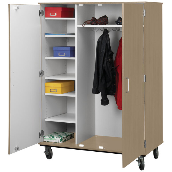 A Pepperdust I.D. Systems closed shelf and coat storage cart with locking doors.