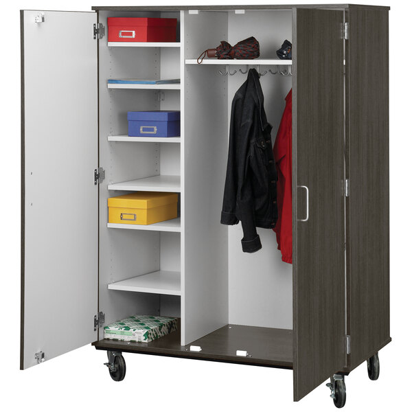A dark grey I.D. Systems storage cart with shelves and locking doors.