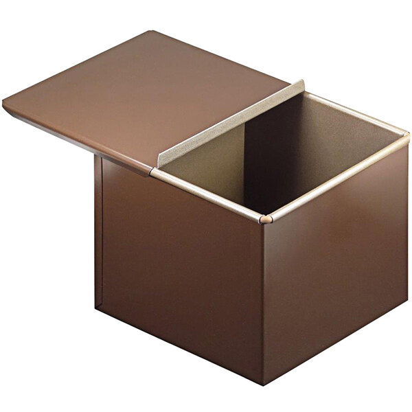 A brown box with a white edge and a lid for a Gobel non-stick bread pan.