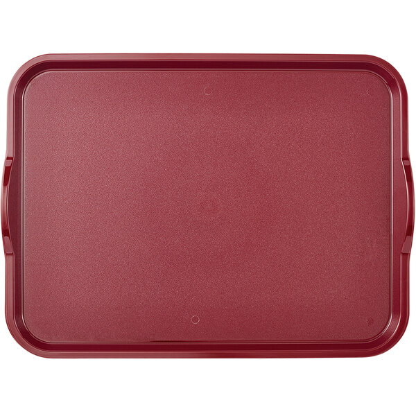 A dark cranberry rectangular Cambro fast food tray with handles.