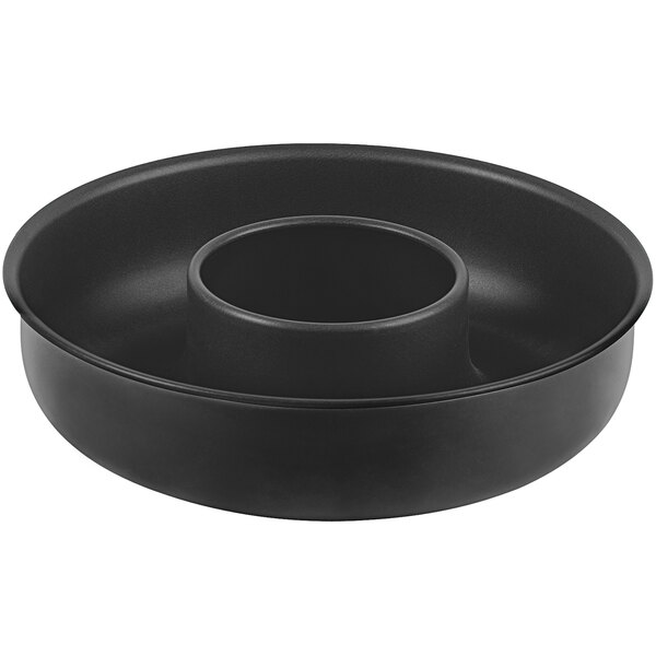 A black round Gobel Savarin cake pan with a round center.