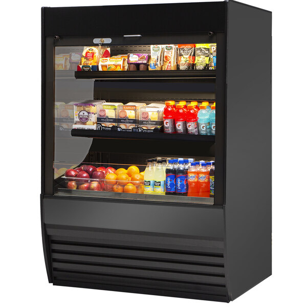 A black Federal Industries Vision Series refrigerated self-serve merchandiser with different types of food on shelves.