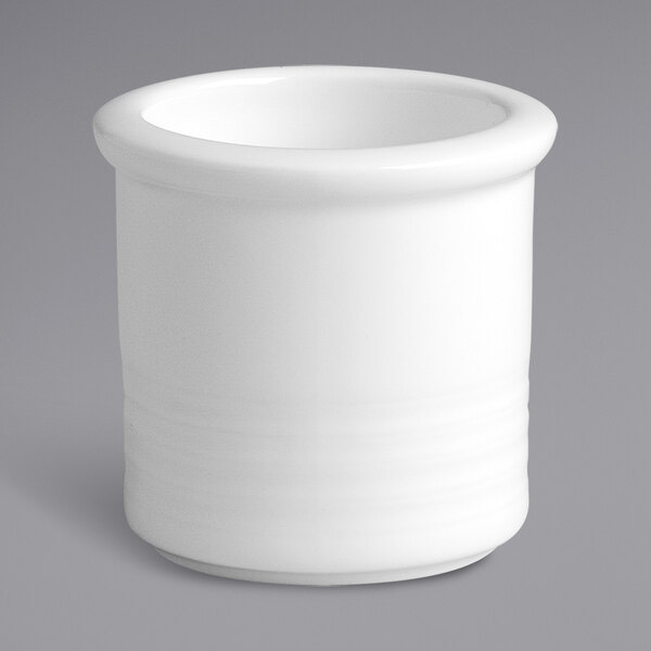 A RAK Porcelain ivory porcelain toothpick holder with an embossed curved edge.