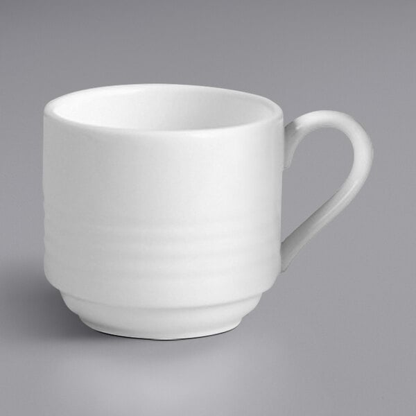 A RAK Porcelain ivory stackable cup with a handle.