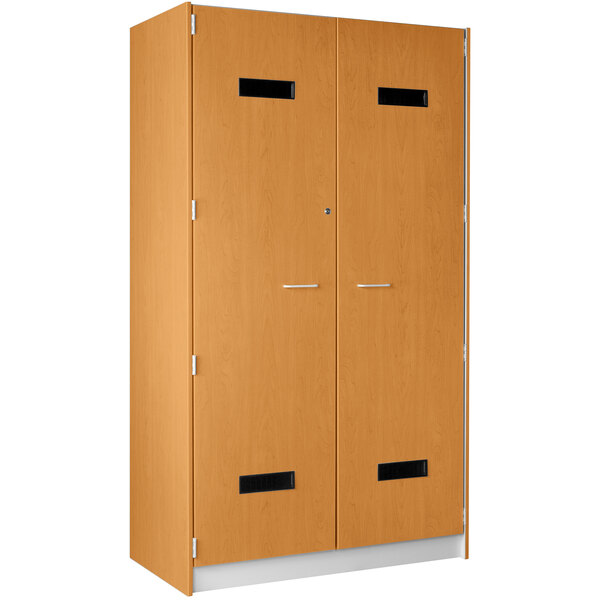 A light oak wooden locker with two doors and silver handles.