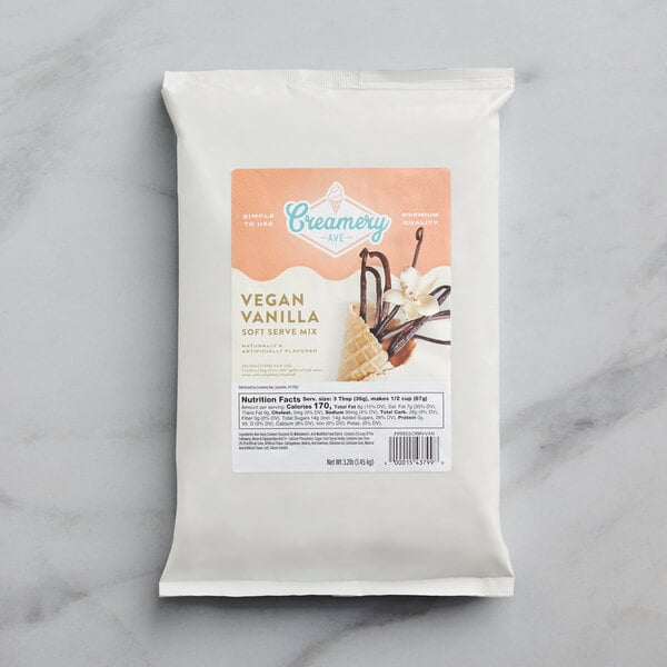 A package of Creamery Ave. Vegan Vanilla Soft Serve Mix on a white surface.