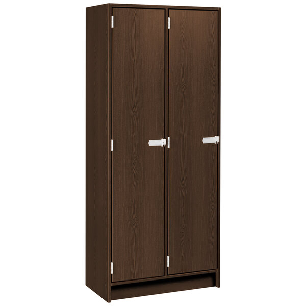 A dark brown wooden double door storage locker with two shelves.