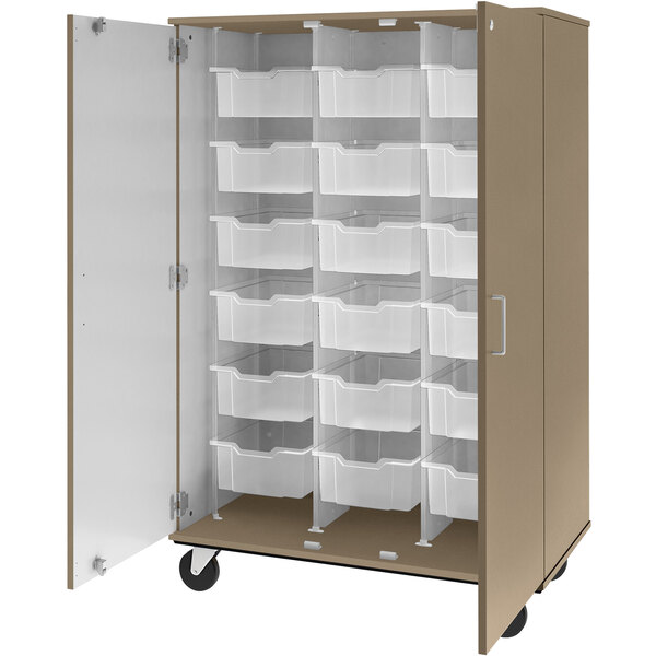 A brown I.D. Systems mobile storage cabinet with white bins on the door.