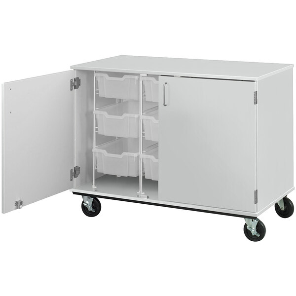 An I.D. Systems mobile storage cabinet with open shelves and bins on a white background.