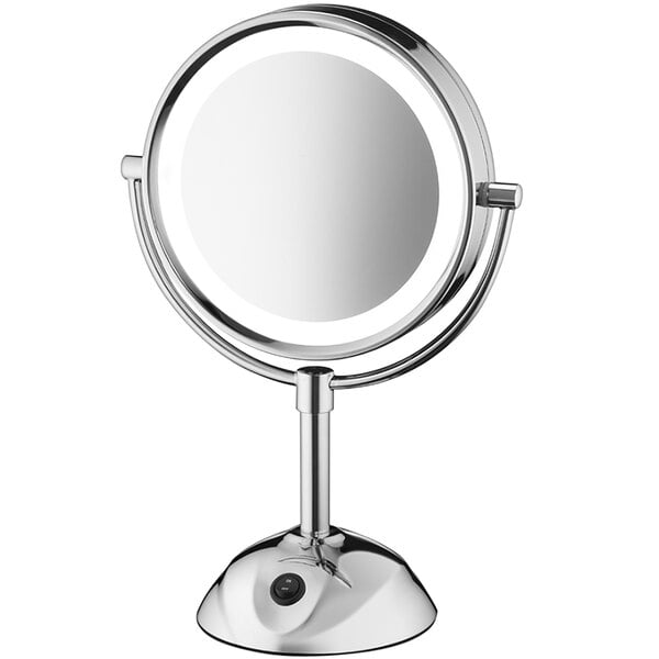 A Conair chrome 2-sided lighted vanity mirror on a stand.