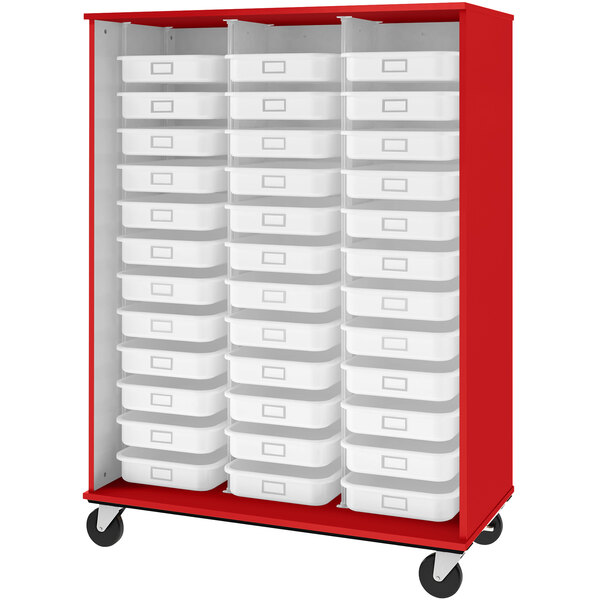 A red storage cabinet with white trays in it.