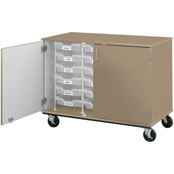 A white I.D. Systems mobile storage cabinet with drawers on wheels.