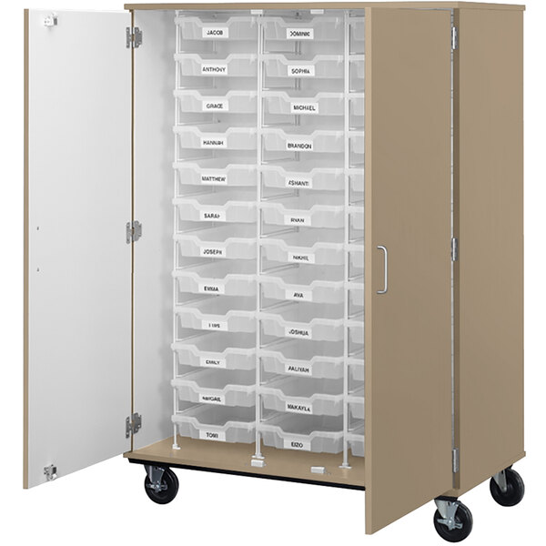 A brown I.D. Systems storage cabinet with 36 white bins and 3 drawers.