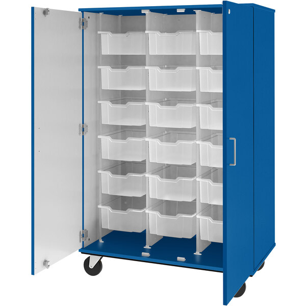 A royal blue I.D. Systems mobile storage cabinet with white bins.