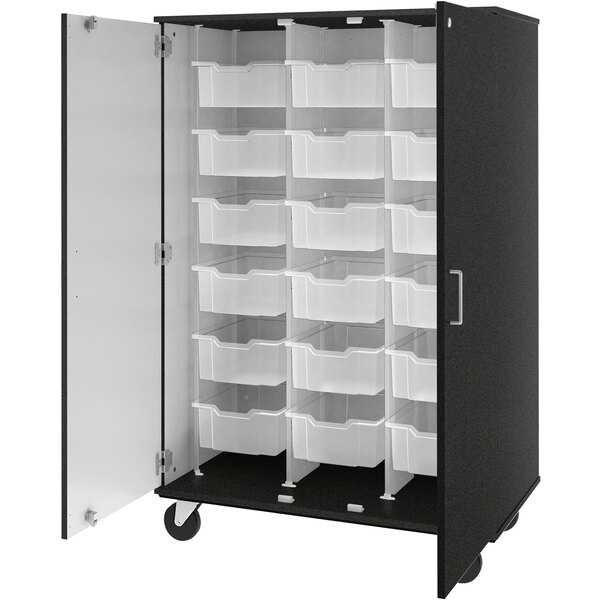 A black and white I.D. Systems mobile storage cabinet with white bins.
