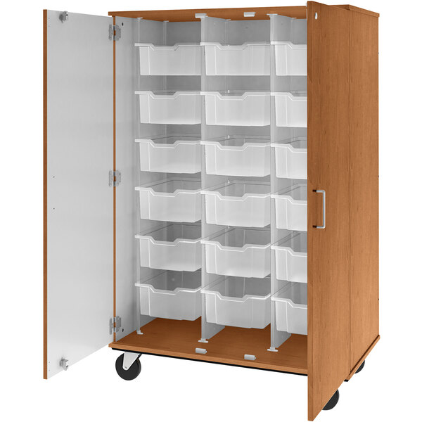 A medium cherry wooden storage cabinet with white plastic bins.