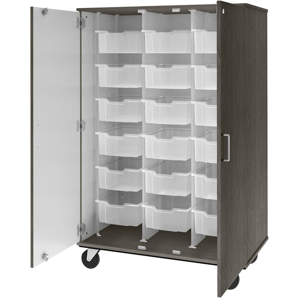 An I.D. Systems mobile storage cabinet with dark elm doors and (18) plastic bins inside.