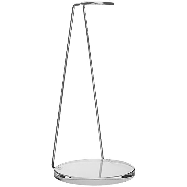A Decantus table stand with a metal base and glass top.